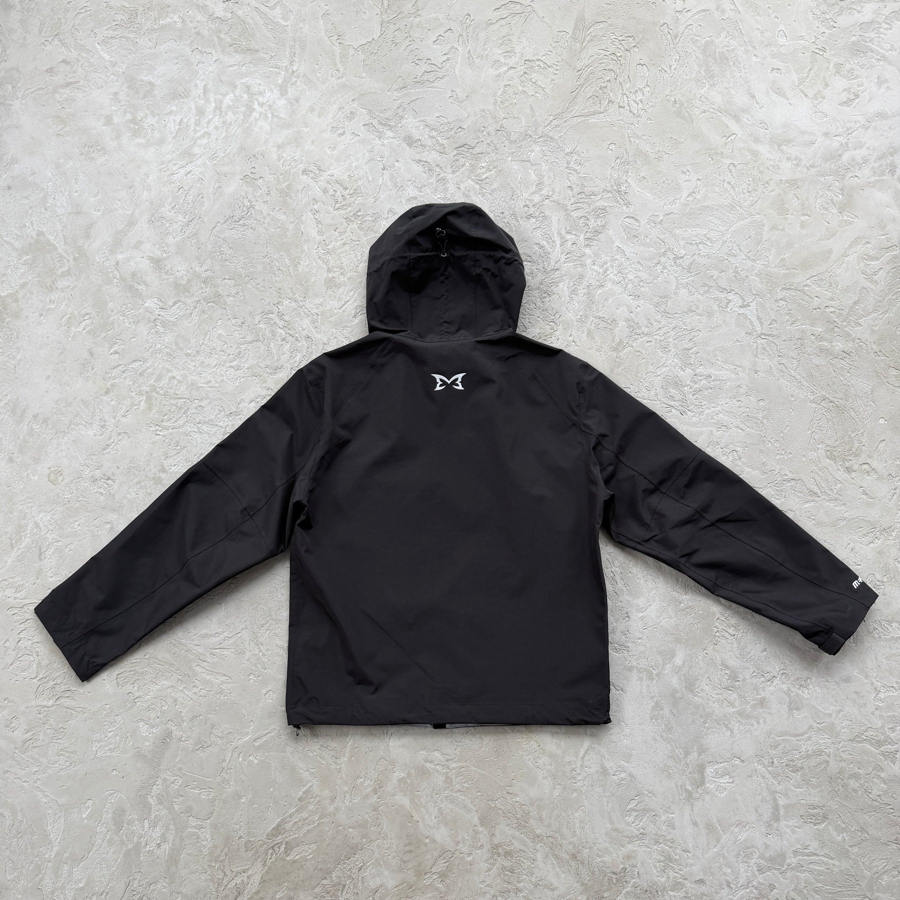 Corta Vento Mertra “Monogram Shell V2” ( Pova D'água )