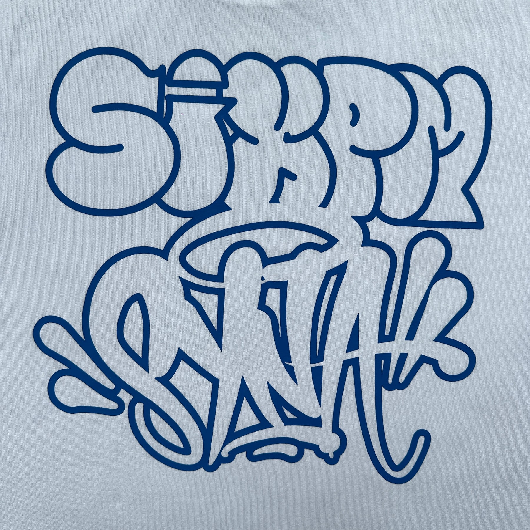 Camisa Syna World X 6PM “Can't Rush Greatness” ( Branca )