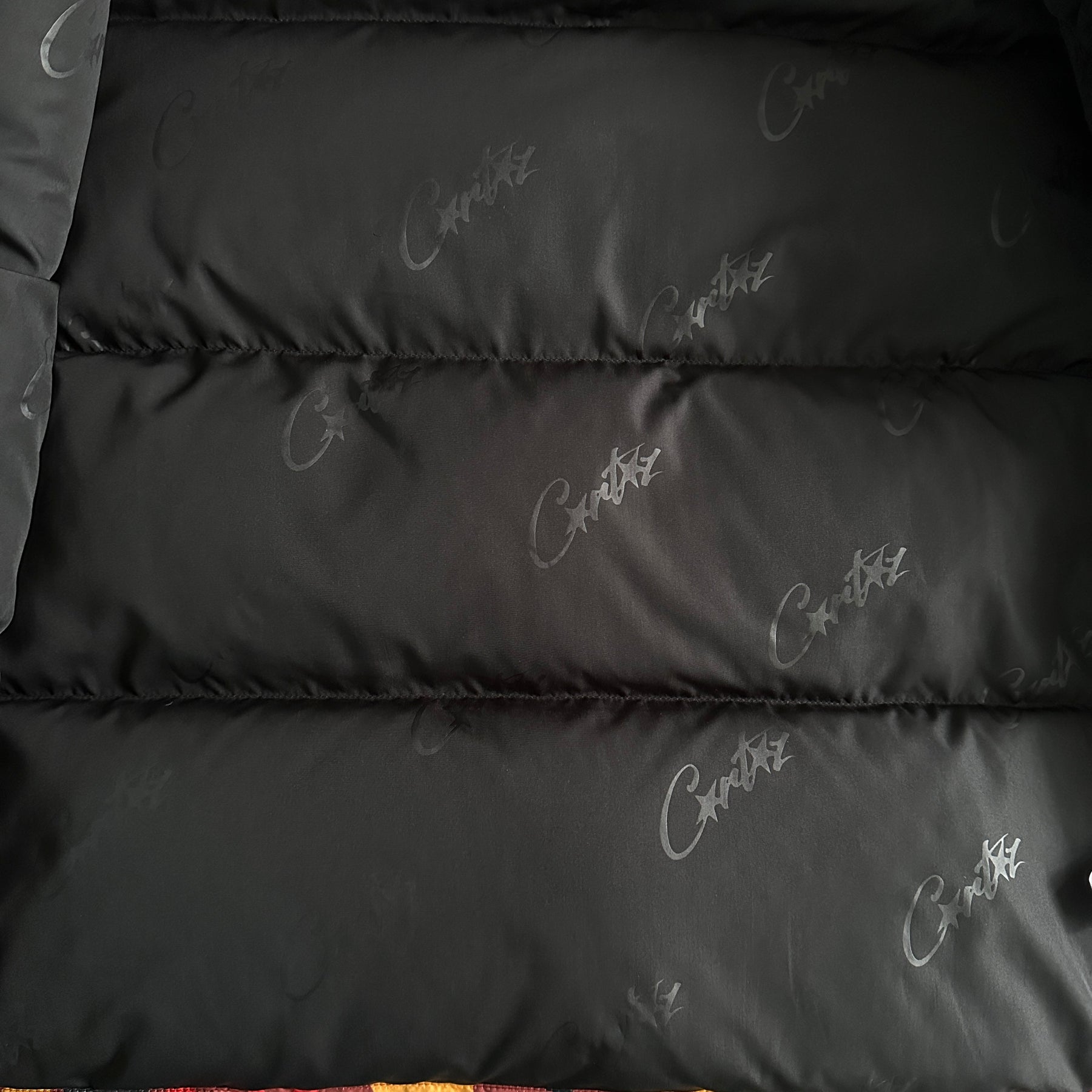 Jaqueta Corteiz “Bolo V2 Down”