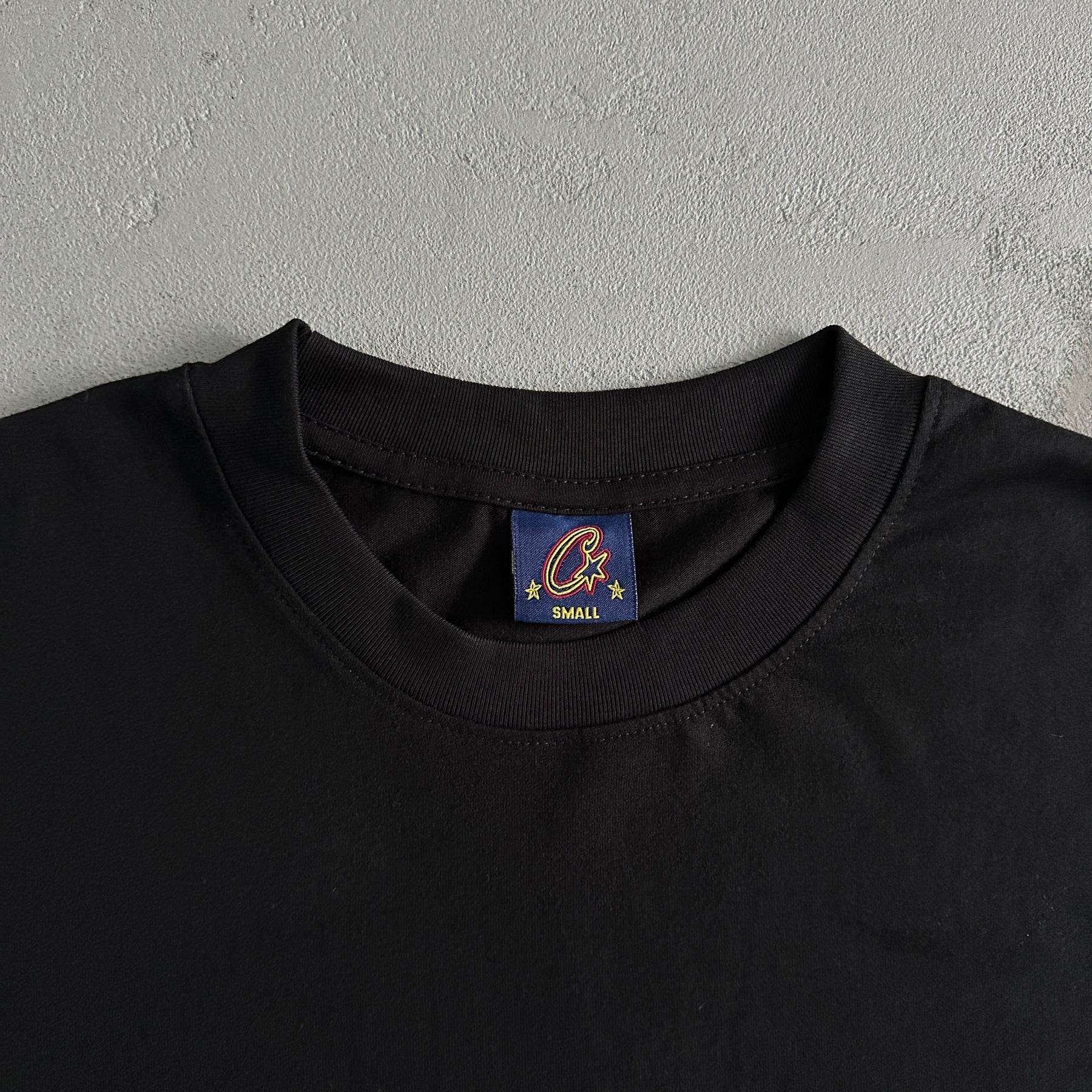 Camisa Corteiz “Badge”