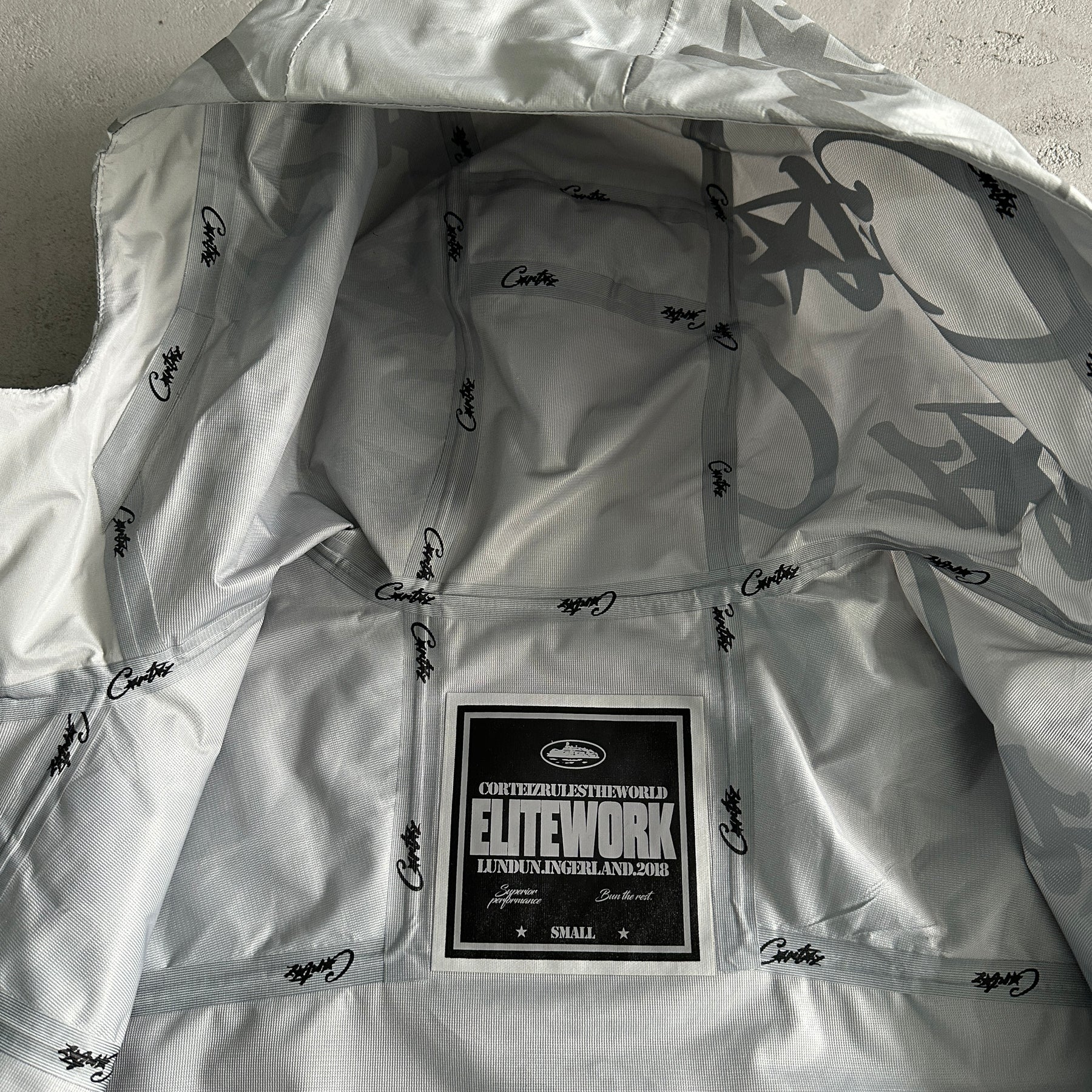 Jaqueta Corteiz “Elitework Shell ”