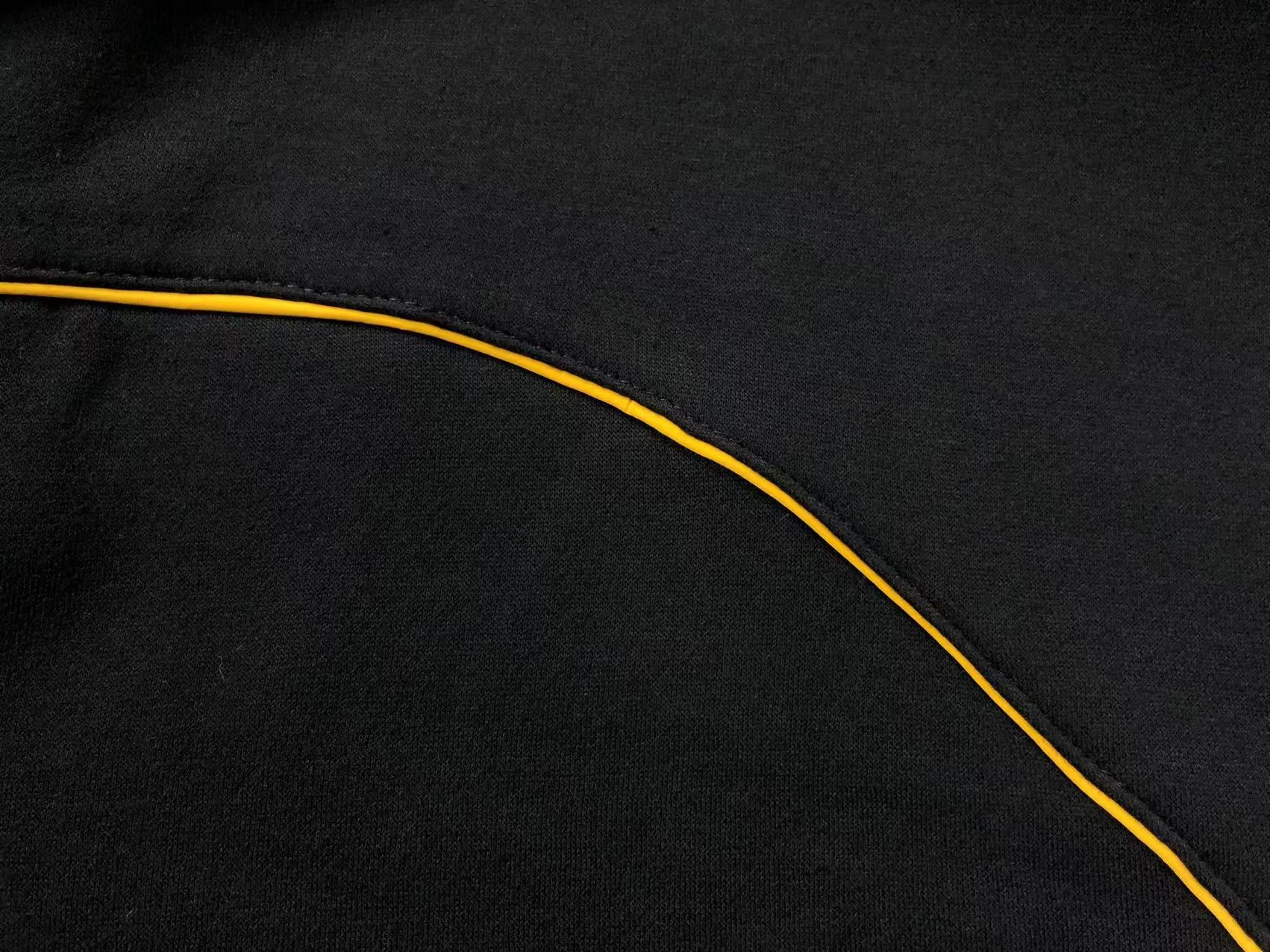 Conjunto Nocta x Nike “University Gold”