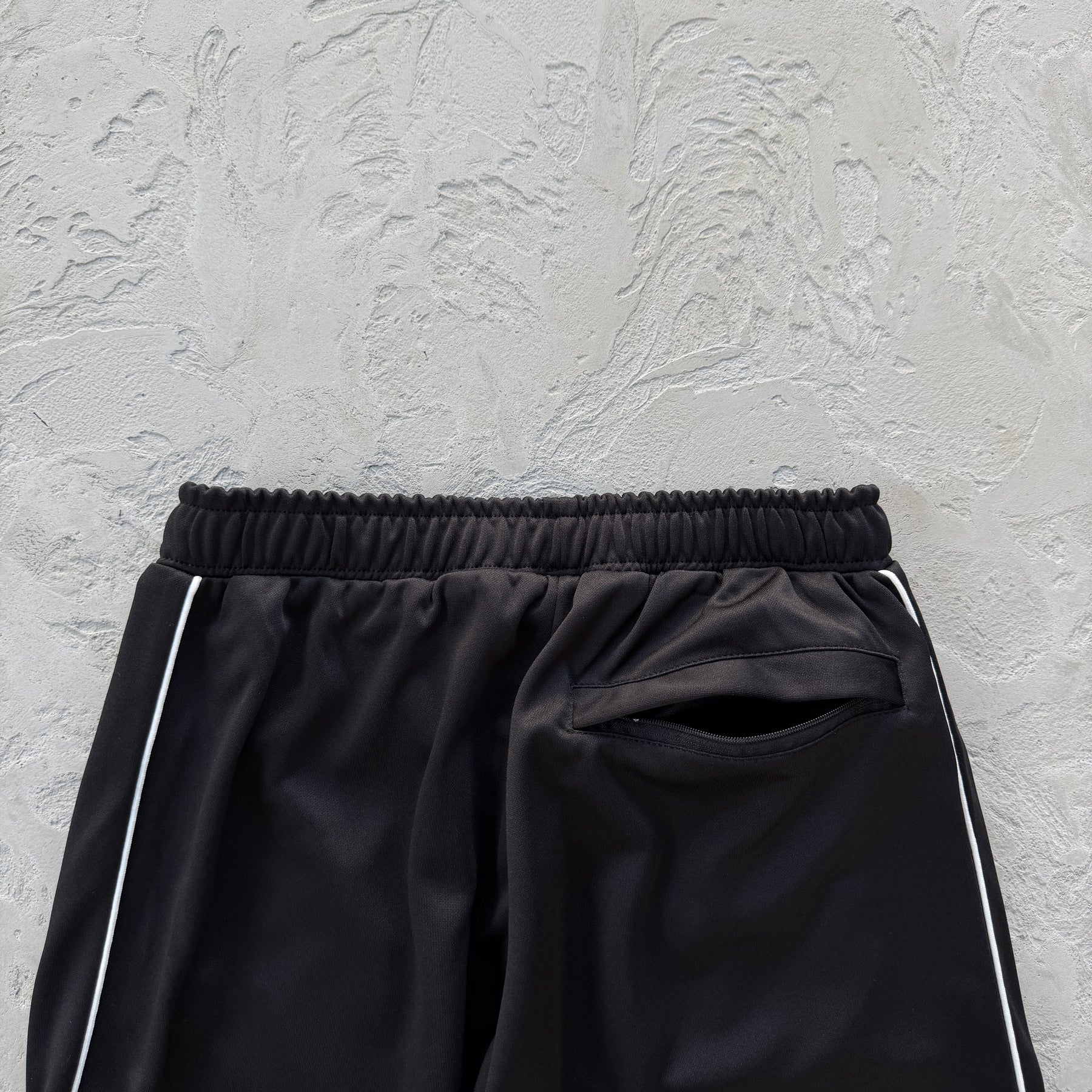 Conjunto Corteiz “Crest Arch Track Set”