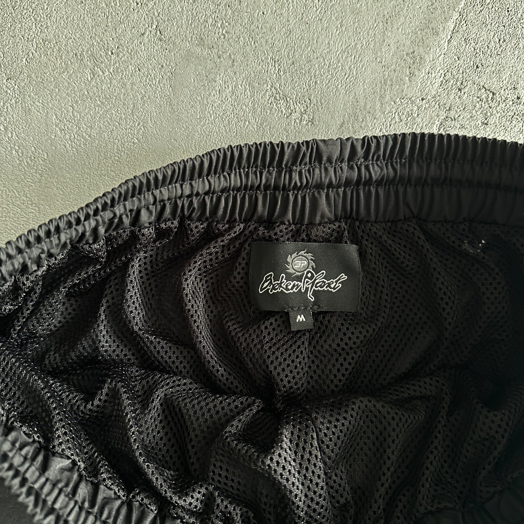 Conjunto Broken Planet “BPM Performance Midnight black”
