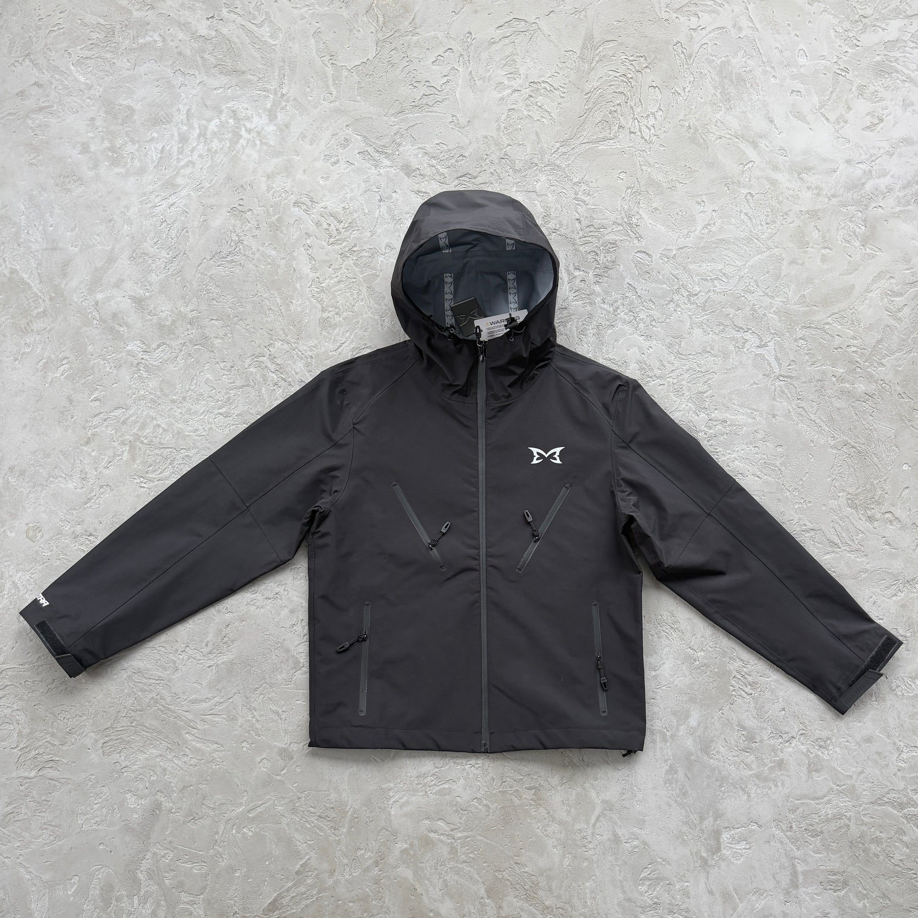 Corta Vento Mertra “Monogram Shell V2” ( Pova D'água )