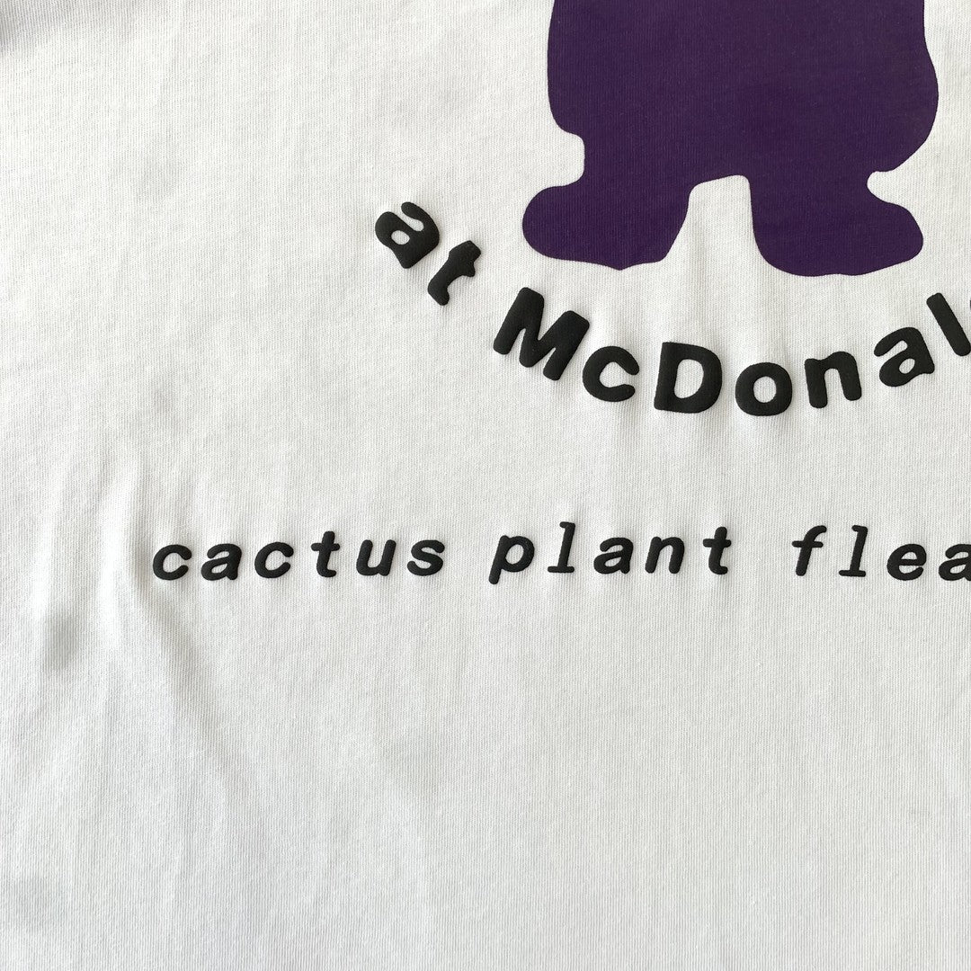 Camisa Cactus Jack x CPFM x McDonald's “All Are Welcome”