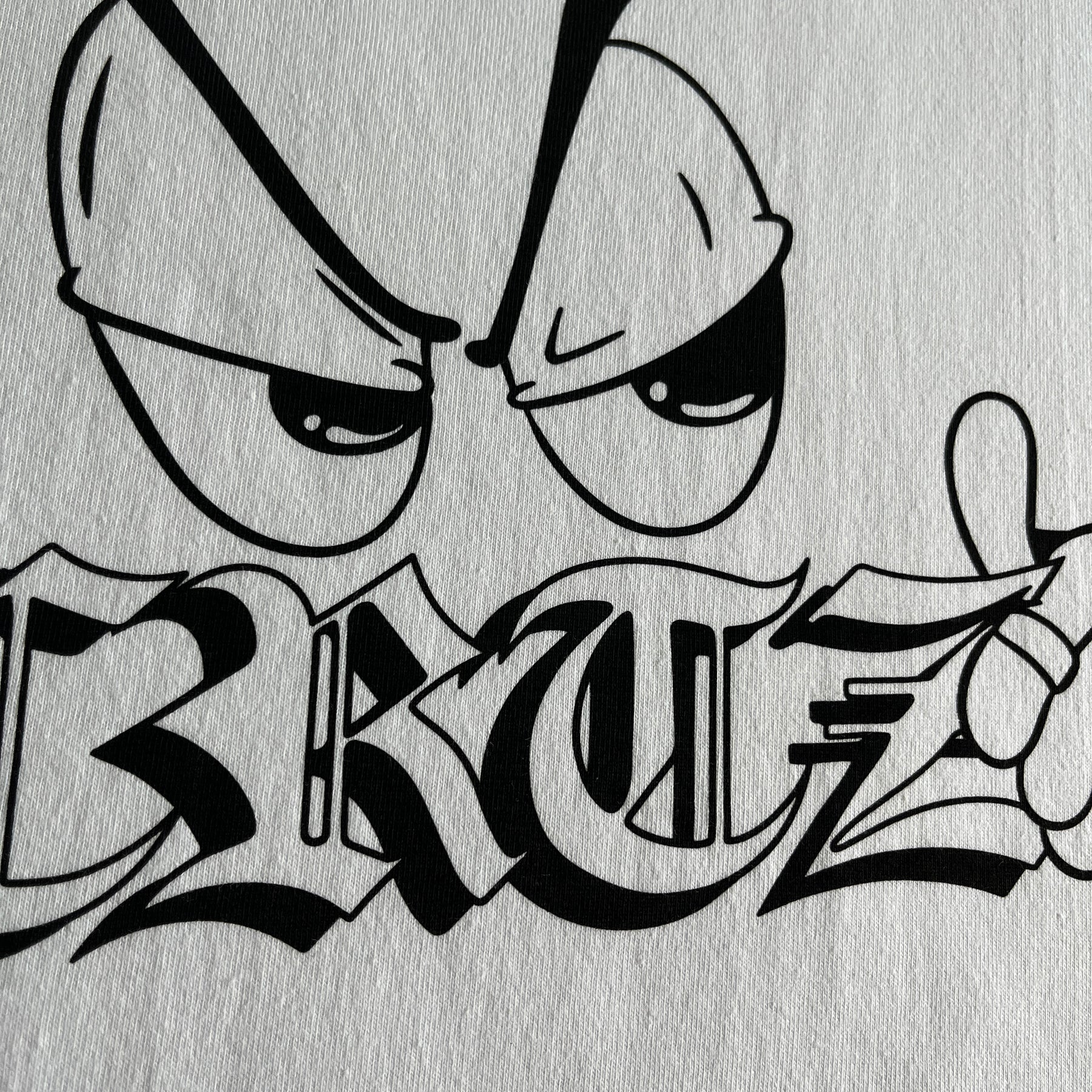 Camisa Corteiz “Cartoon Eyes” ( Branca )