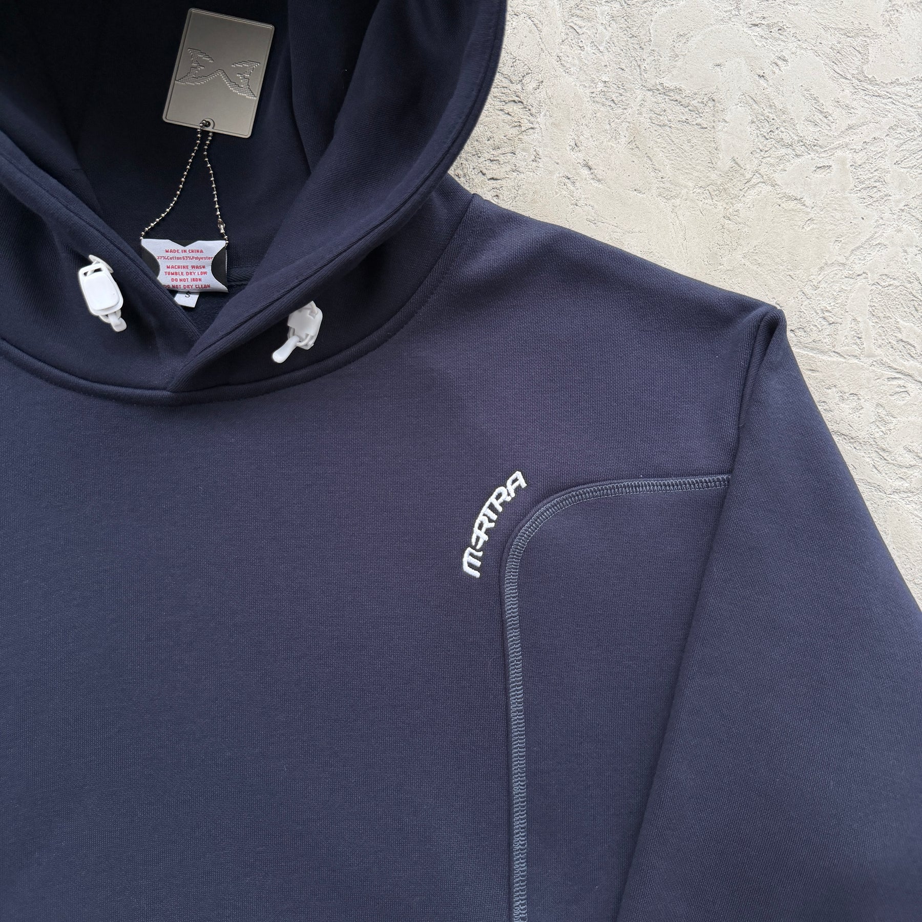 Conjunto Mertra “Glide Overlock Trackie”