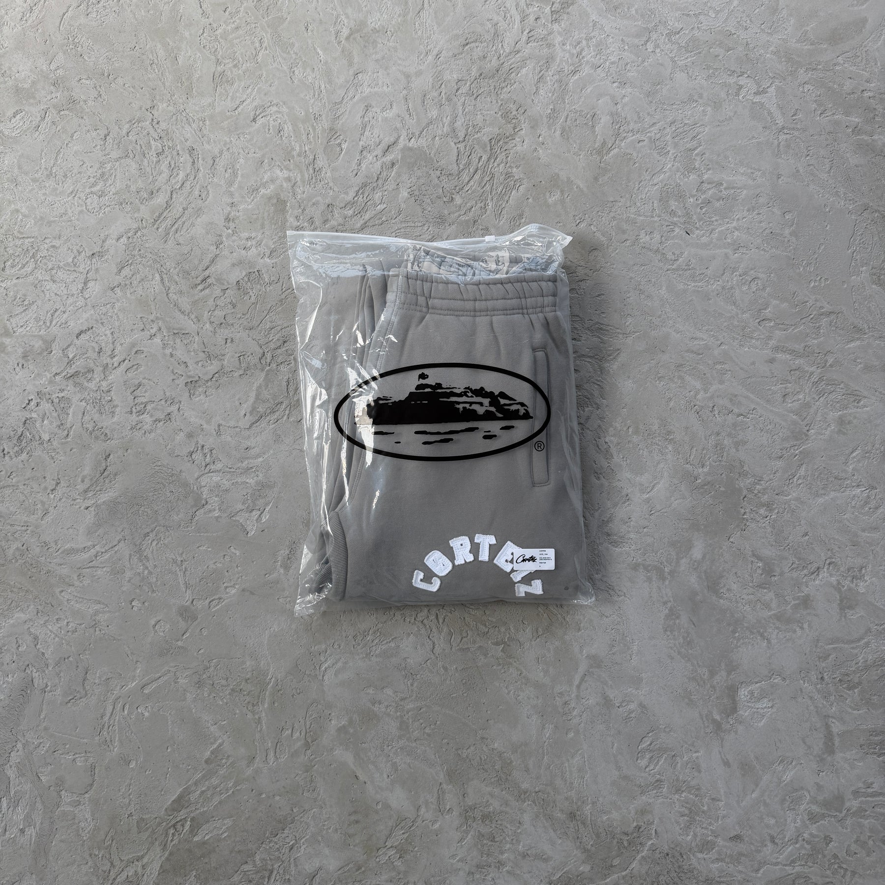 Conjunto Corteiz “College Arch Open” ( Cinza )