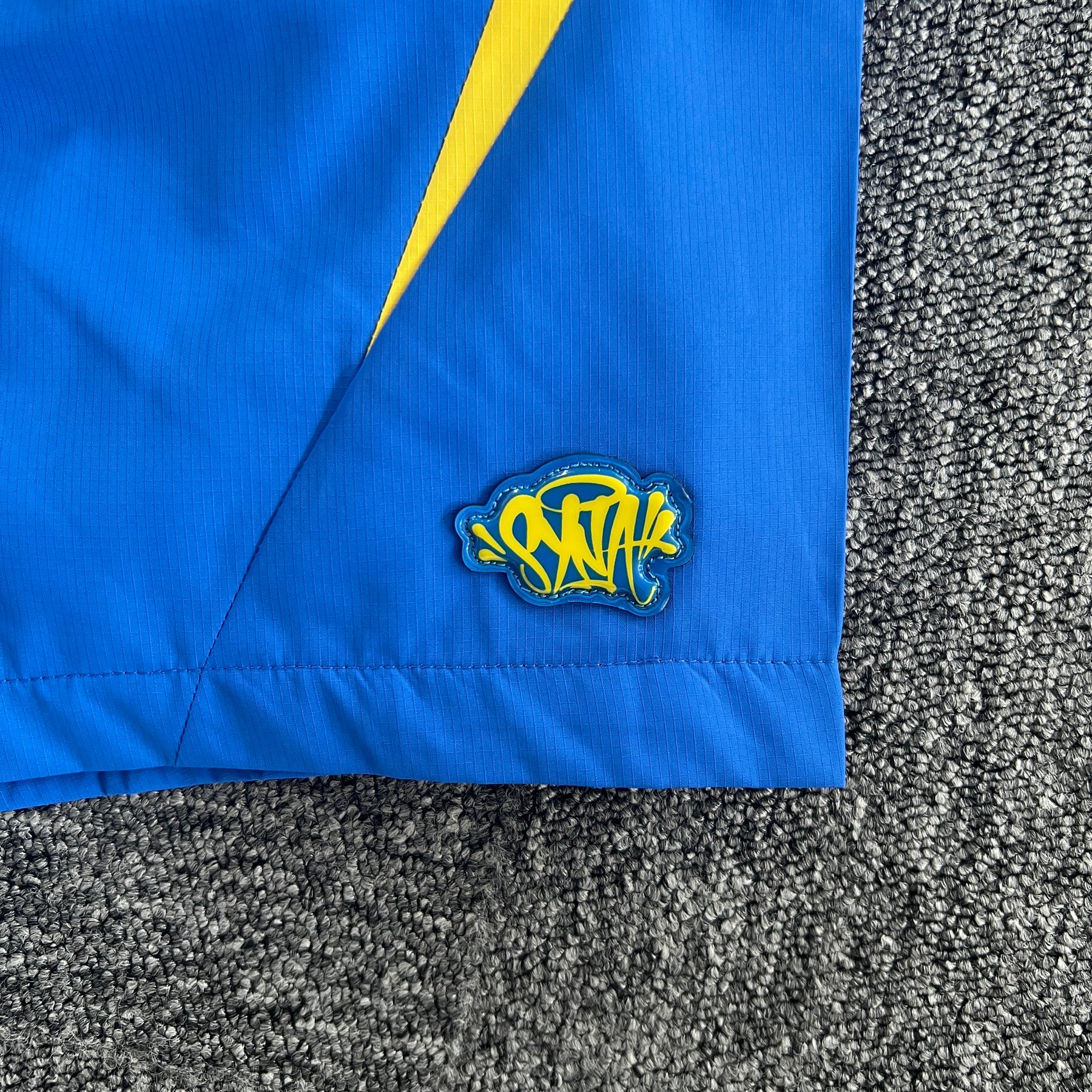 Conjunto Syna World “Vortex Track” ( Azul e Amarelo )