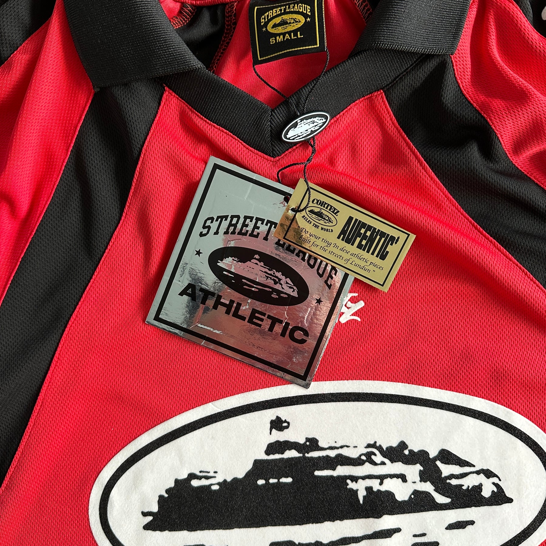 Camisa Corteiz ”Panel” ( Vermelha com Preto )