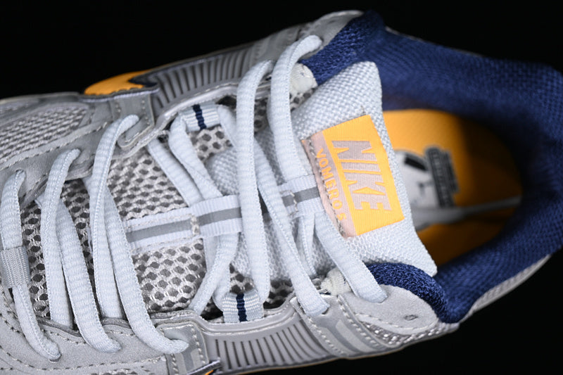Vomero 5 “Pure Platinum Laser Orange”
