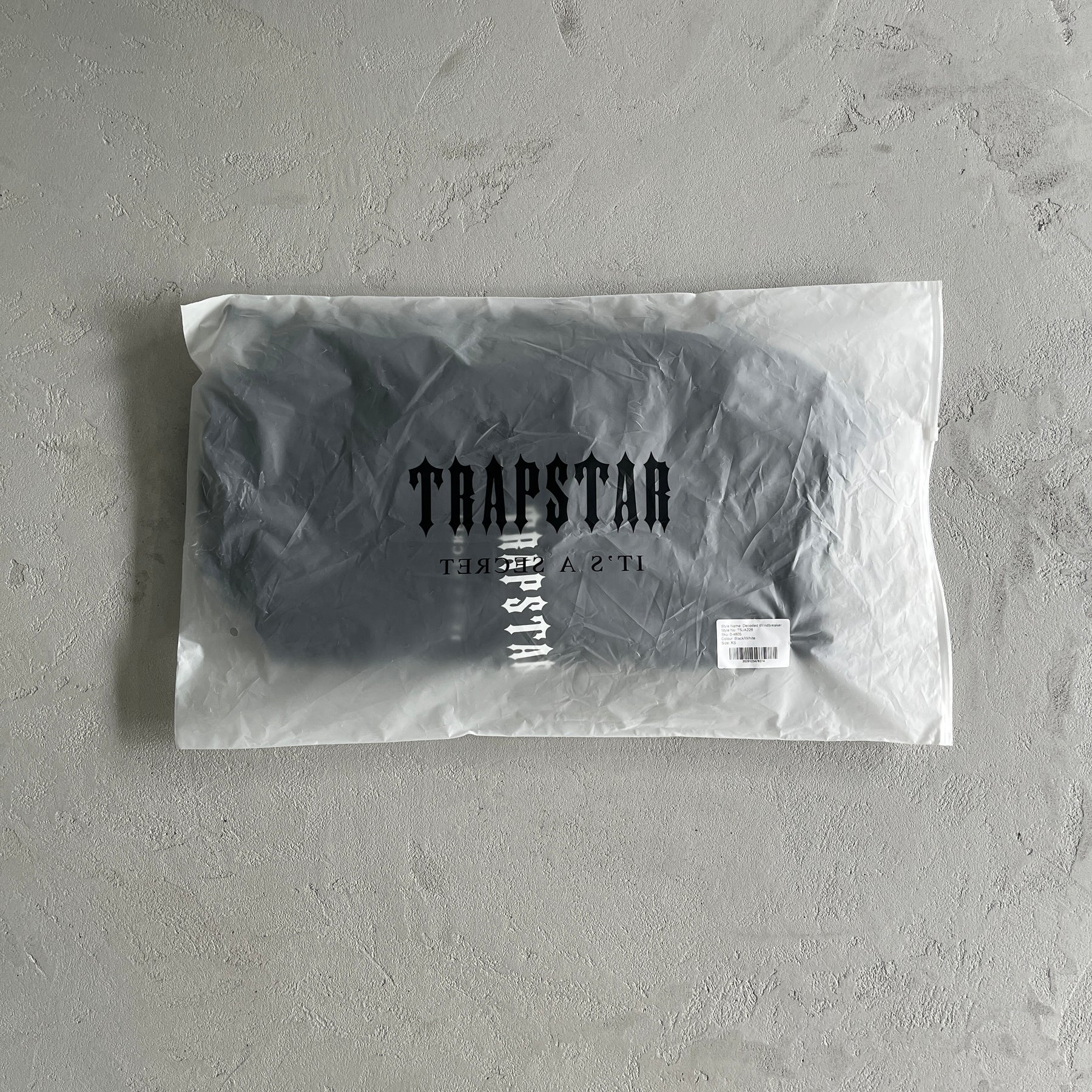 Corta Vento Trapstar “Decoded” ( Preta Com Branca )