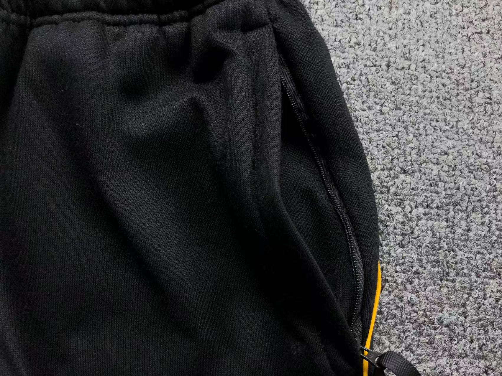 Conjunto Nocta x Nike “University Gold”