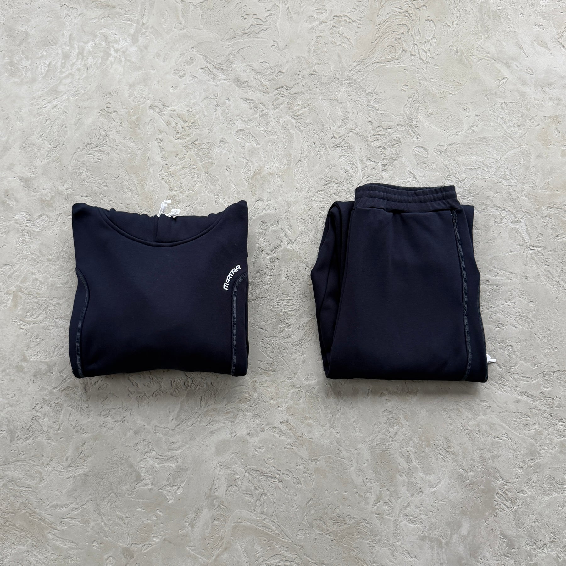 Conjunto Mertra “Glide Overlock Trackie”