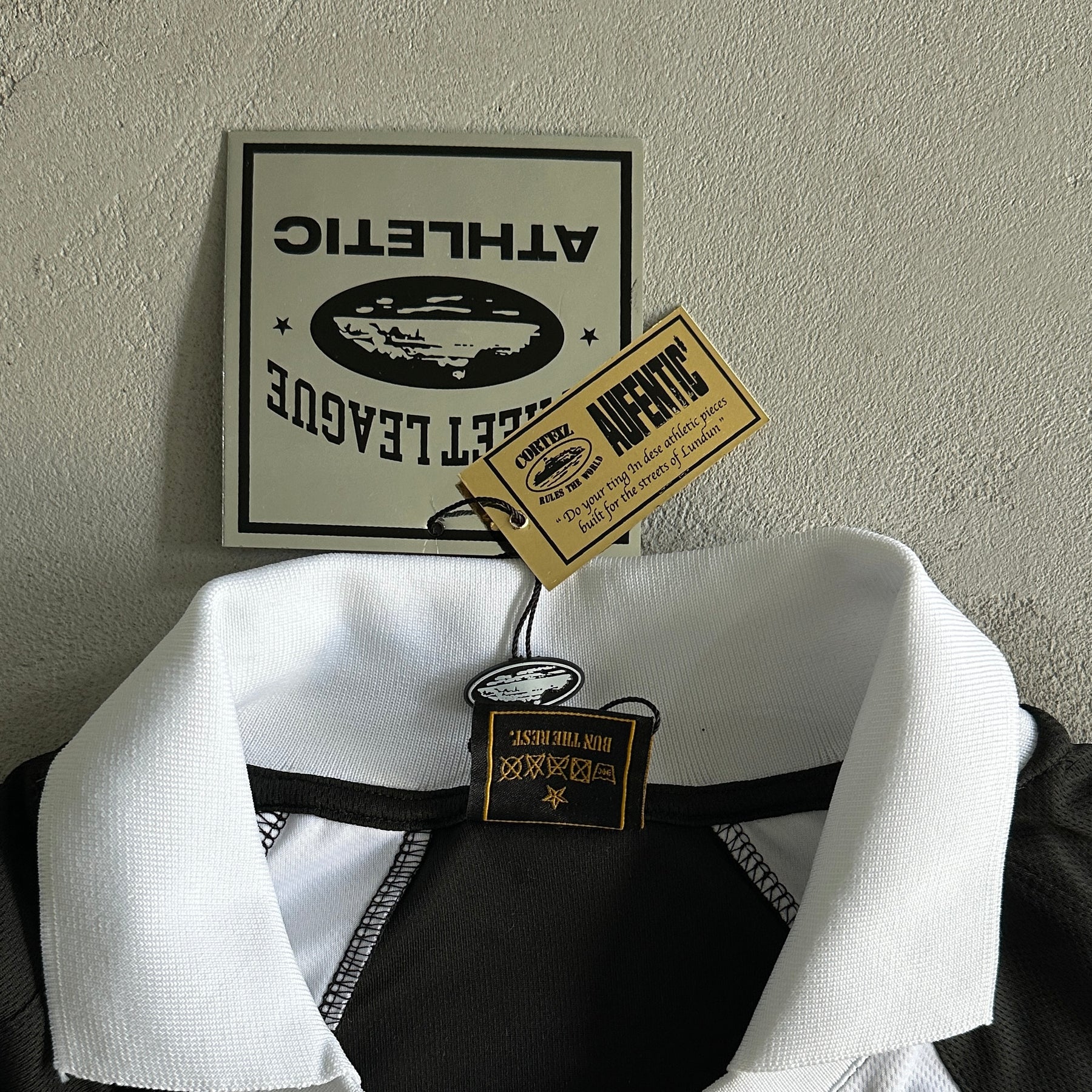 Camisa Corteiz ”Panel” ( Preta com Branca )