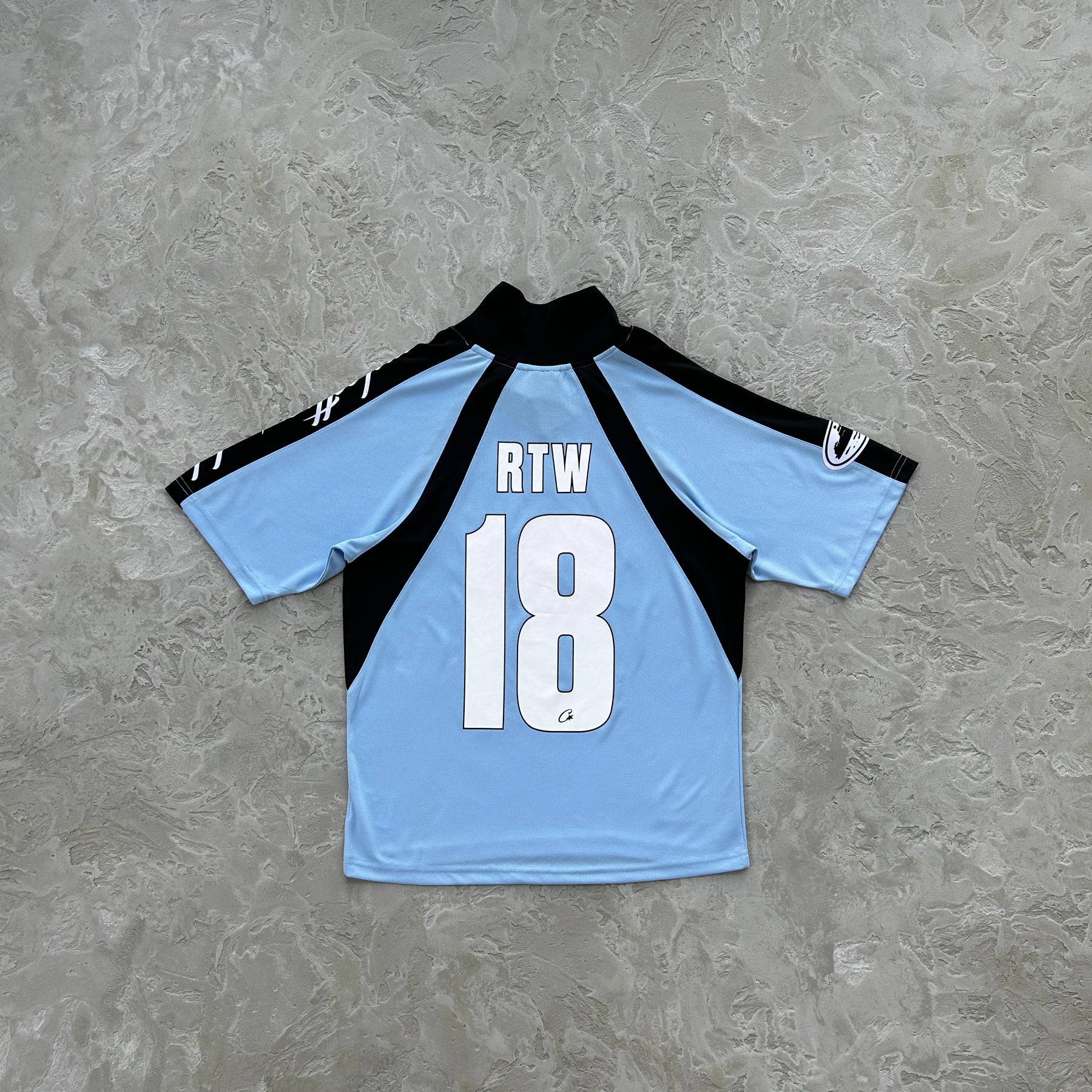 Camisa Corteiz “Panel Sky Blue Jersey”