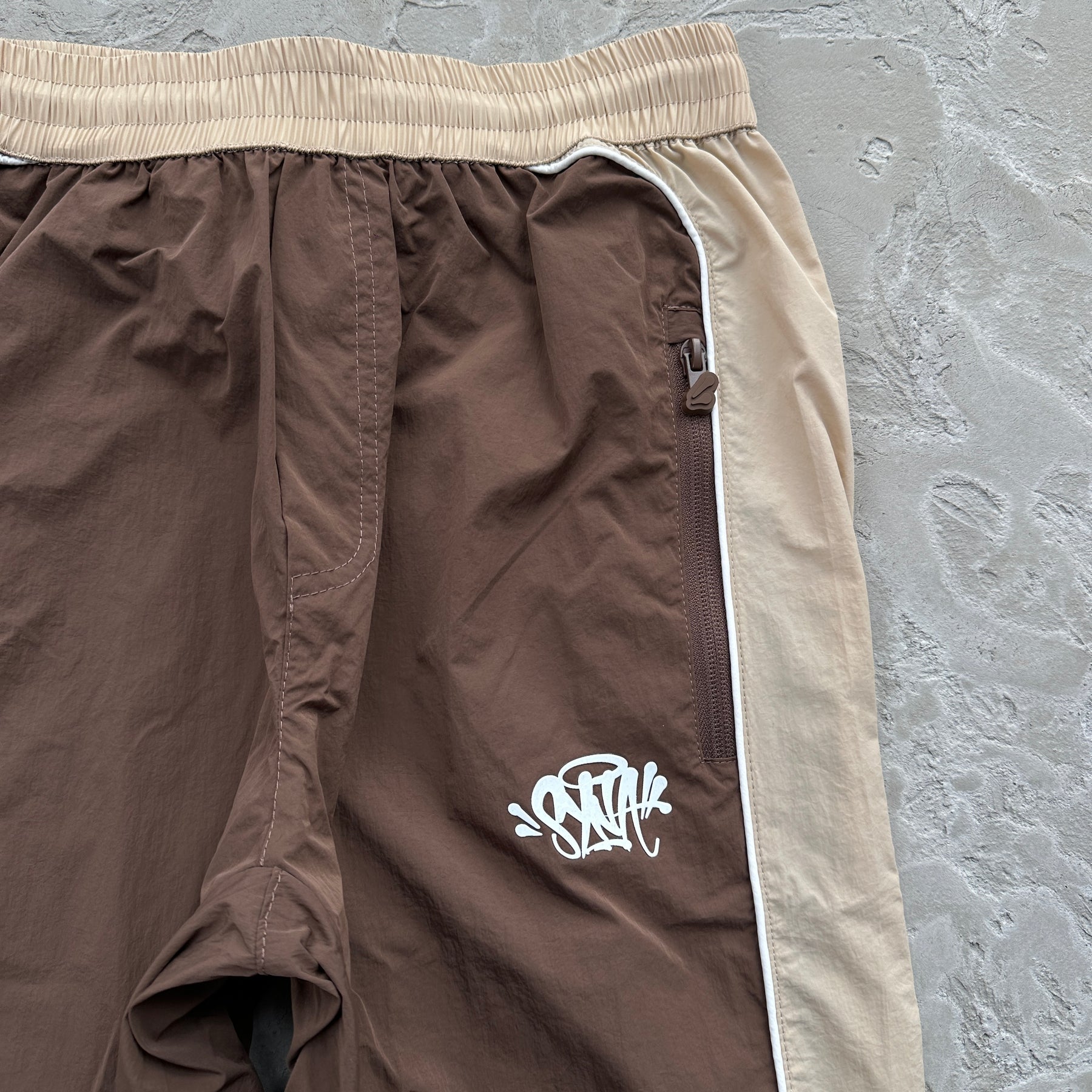 Conjunto Syna World “Team Pipe” ( Marrom )