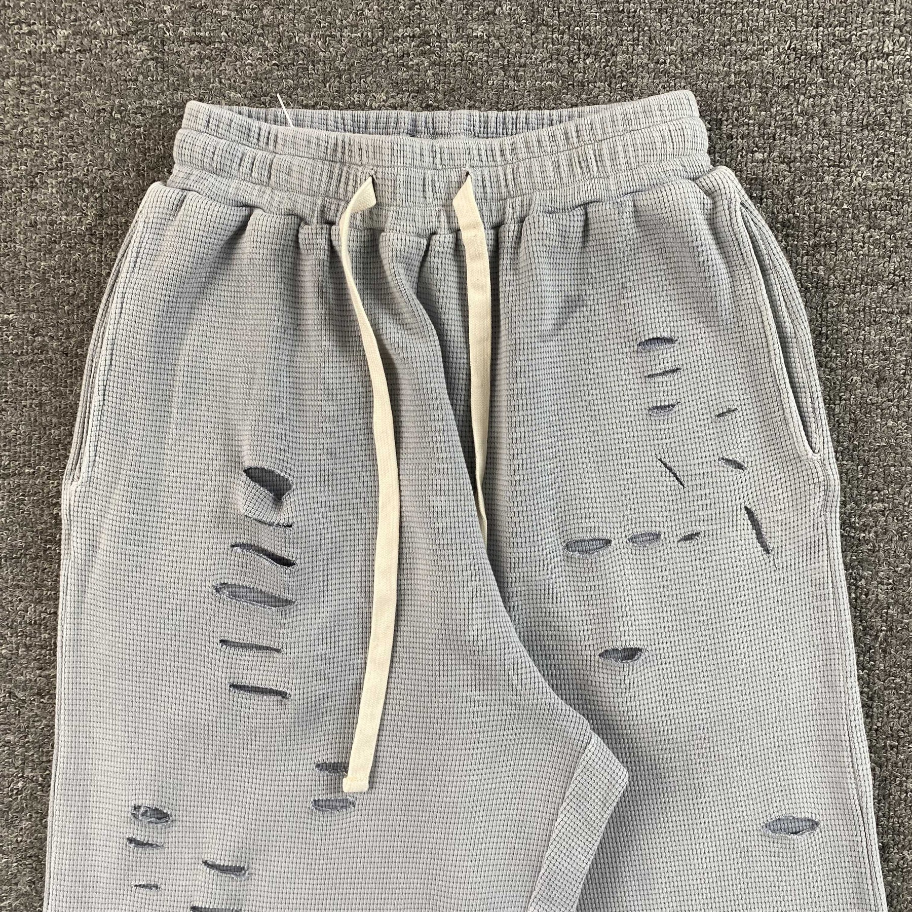 Calça Vertabrae “Ripped Geometric Embroidery”
