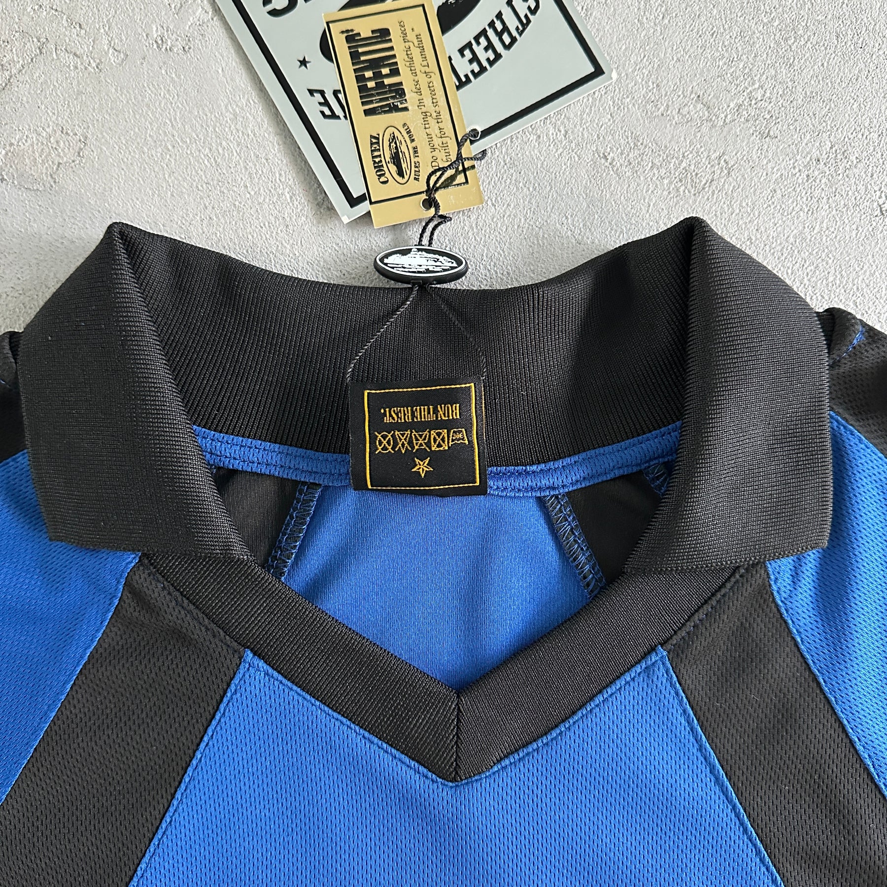 Camisa Corteiz ”Panel” ( Preta Com azul )