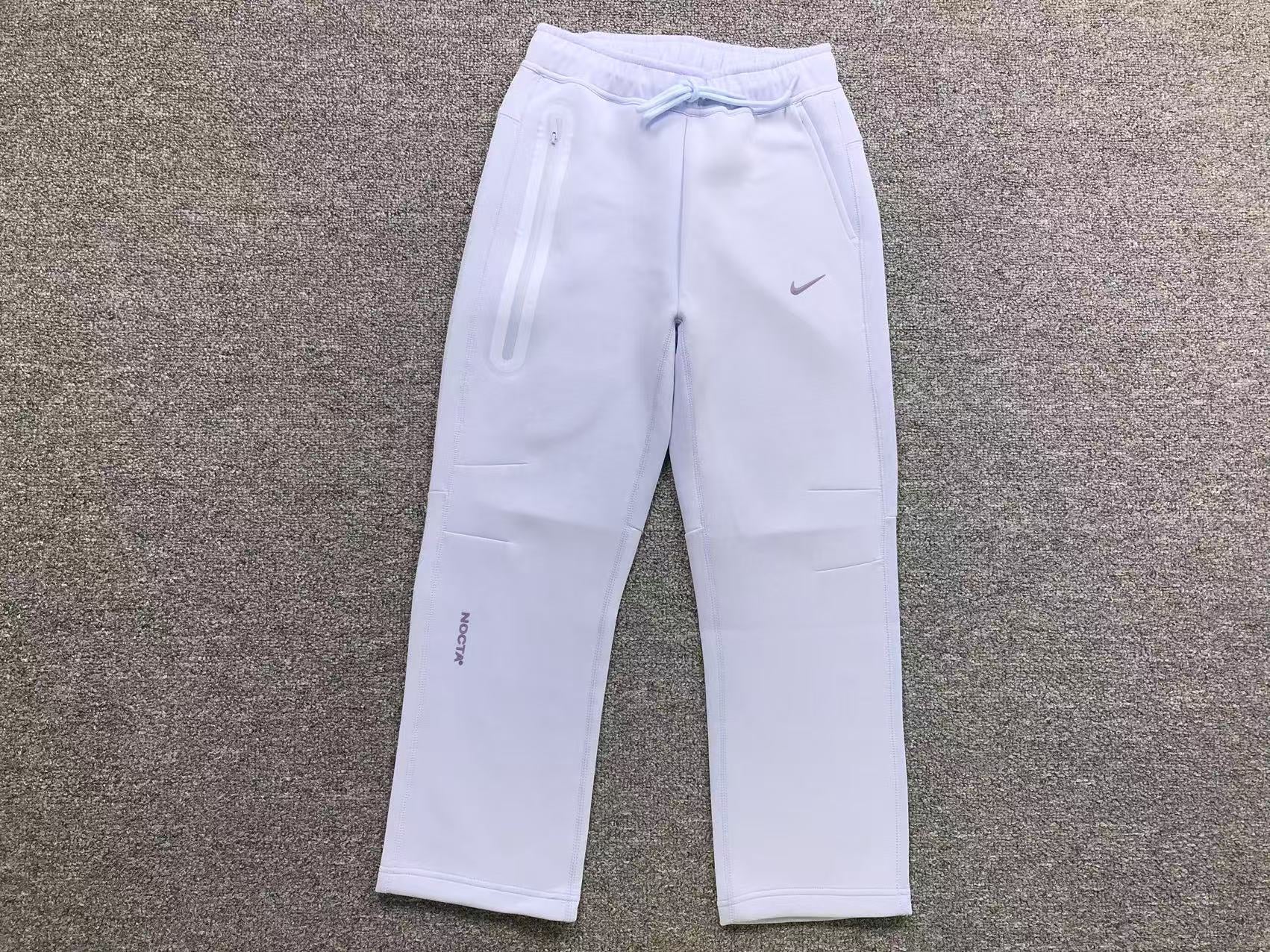 Conjunto Nocta x Nike Tech Fleece “Lavander”