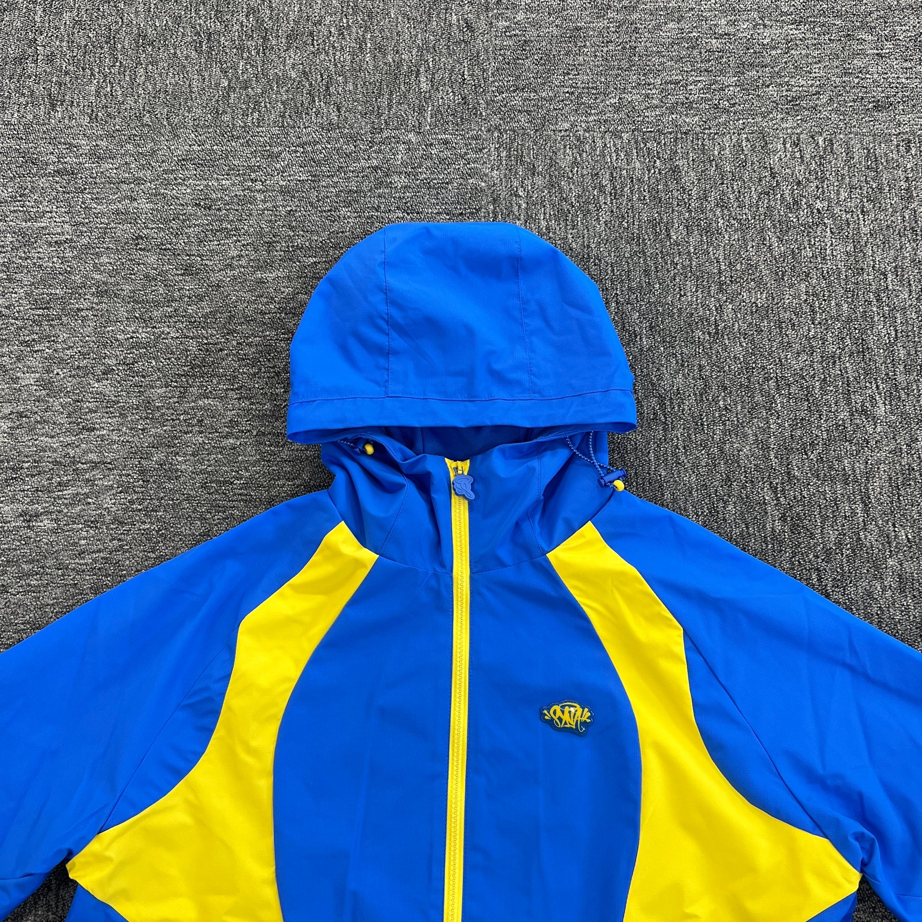 Conjunto Syna World “Vortex Track” ( Azul e Amarelo )