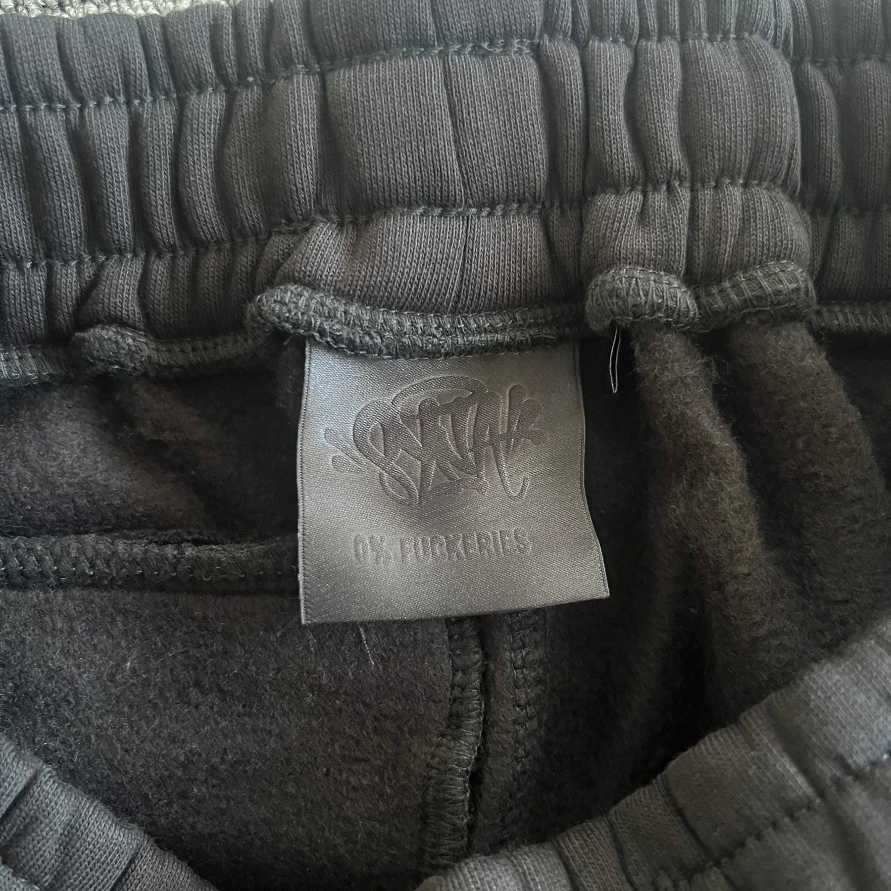 Conjunto Syna World “Syna Team“ ( Preto e Laranja )