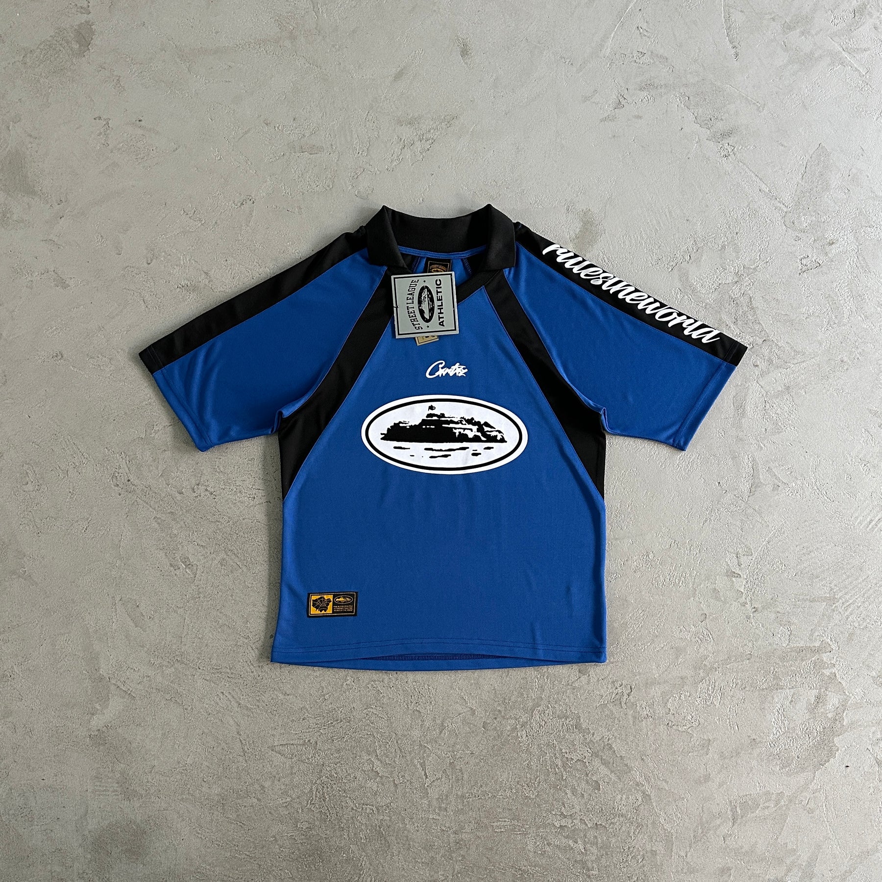 Camisa Corteiz ”Panel” ( Preta Com azul )