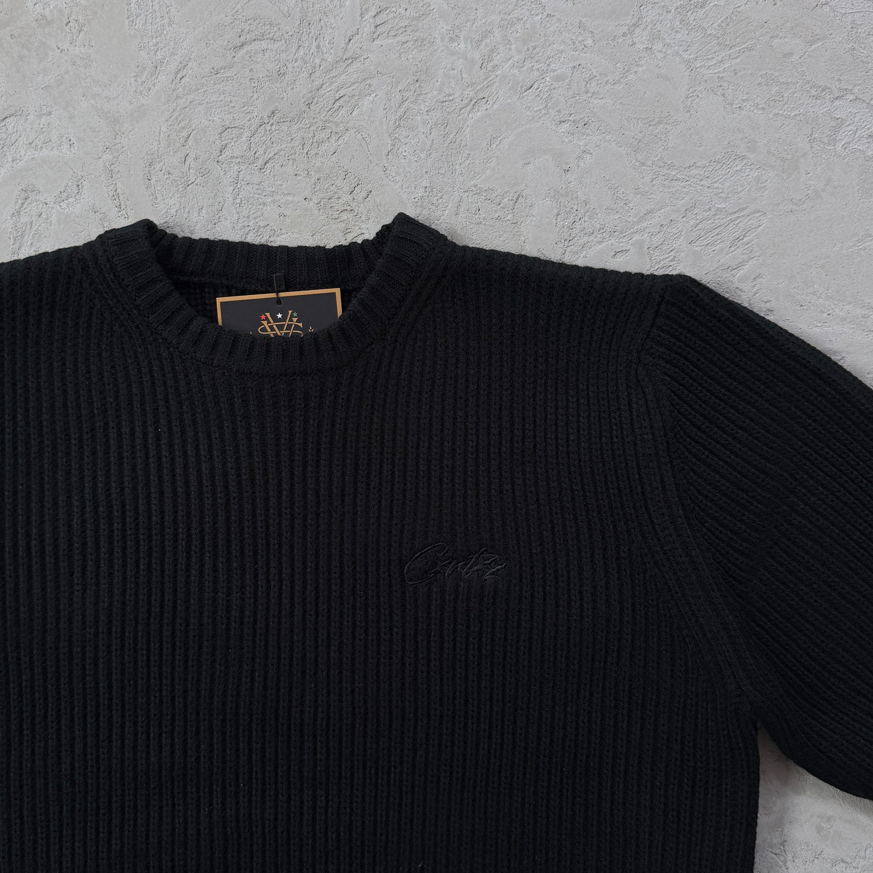 Sueter Corteiz “Crochet Applique Knit Crew”