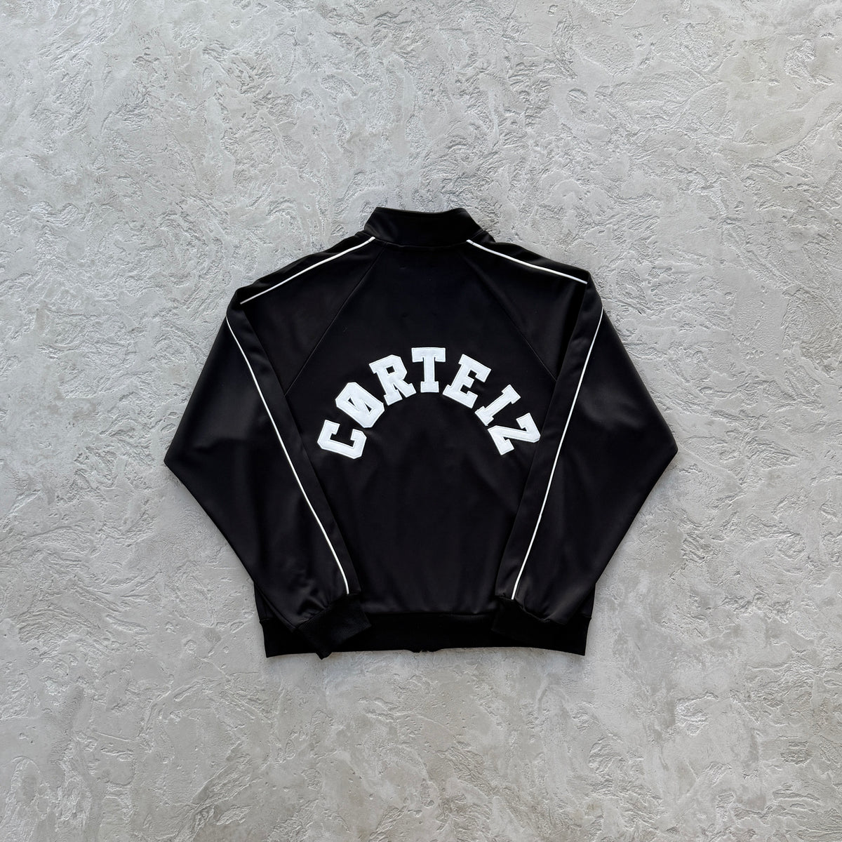 Conjunto Corteiz “Crest Arch Track Set”