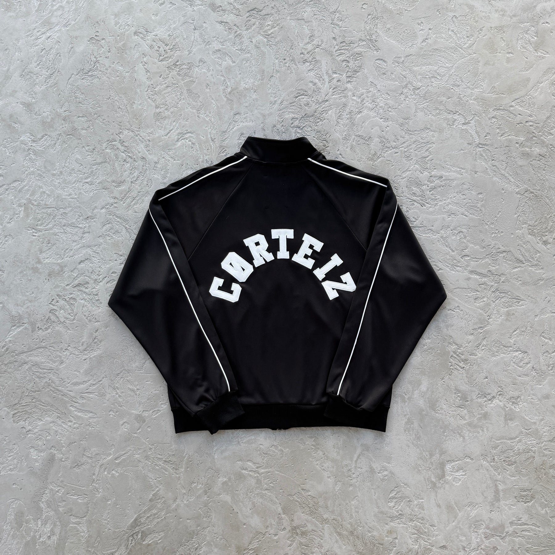 Conjunto Corteiz “Crest Arch Track Set”