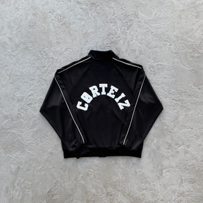 Conjunto Corteiz “Crest Arch Track Set”