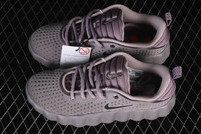 Nike mind 002 “Metallic Cool Grey”