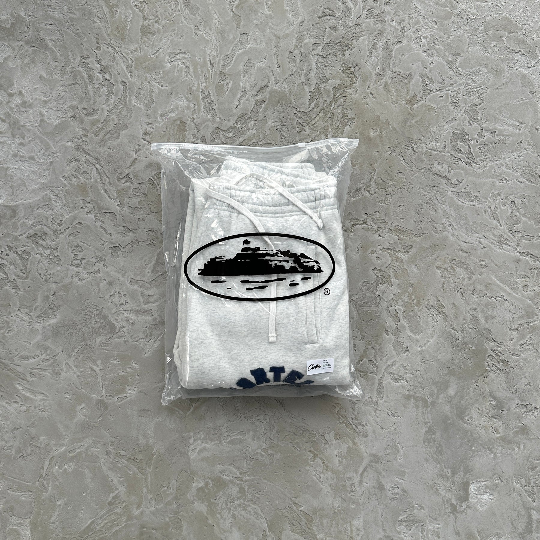 Conjunto Corteiz “College Arch Open”