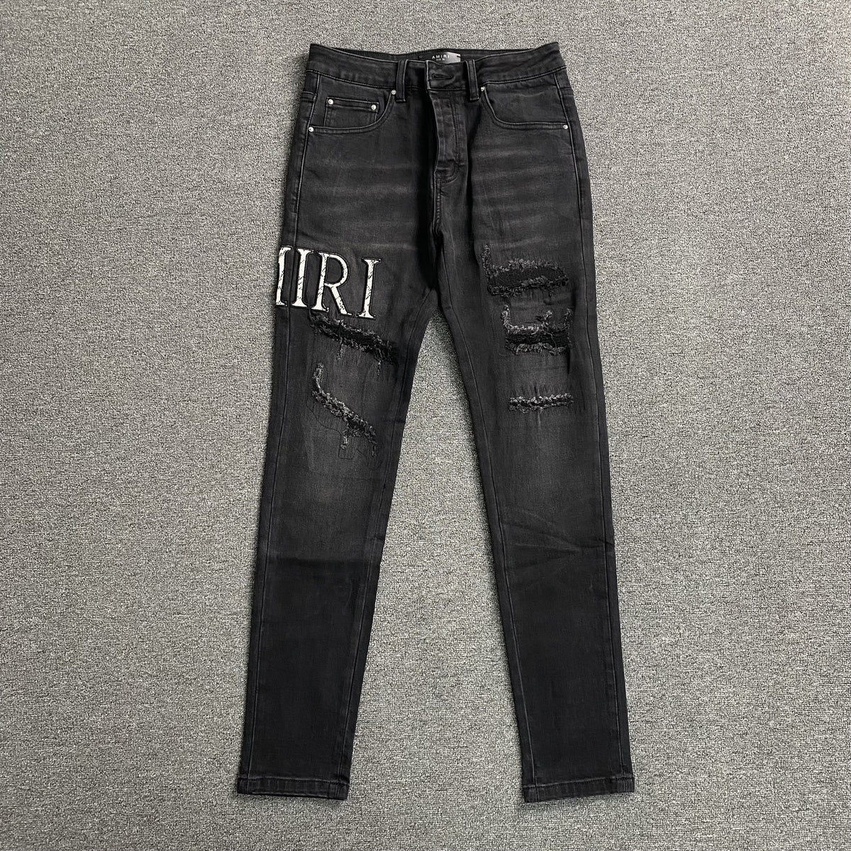 Calça Amiri “Repair”