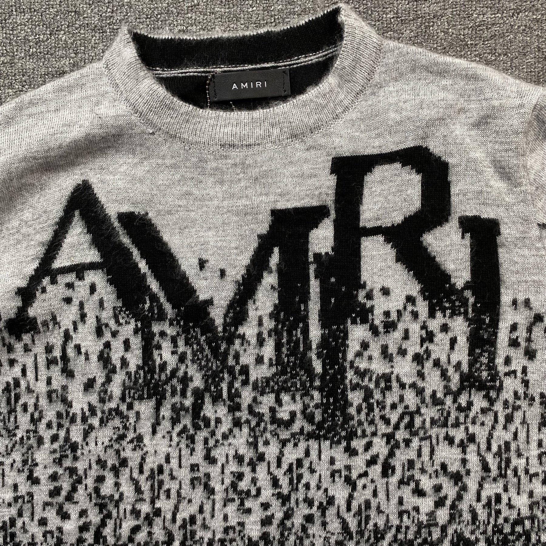 Sueter Amiri “Staggered Gradiant Crewneck”