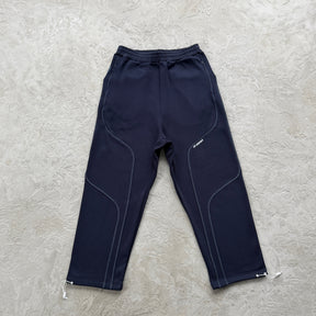 Conjunto Mertra “Glide Overlock Trackie”