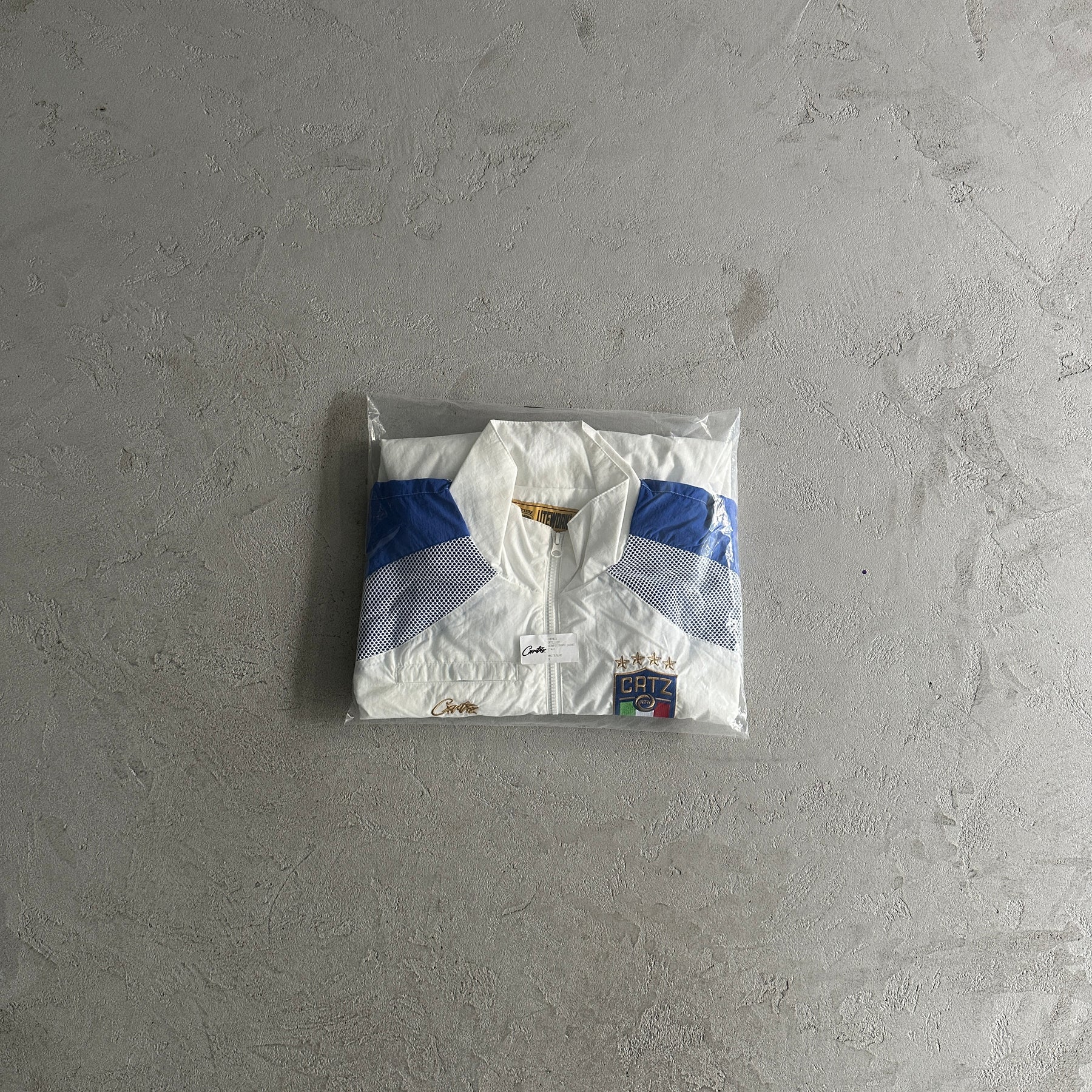 “Conjunto Corteiz” Olympic Shuku ( Branco com azul )