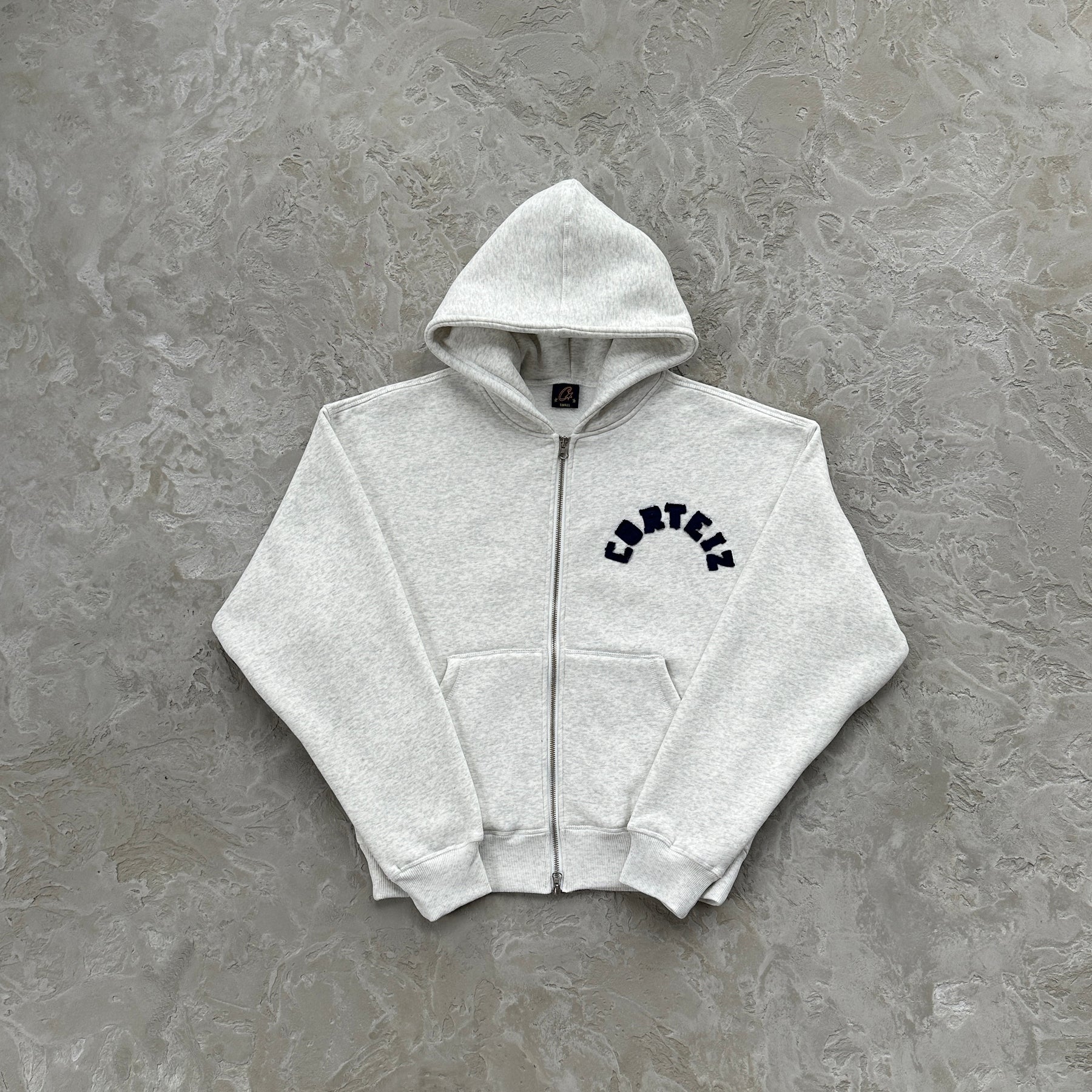 Conjunto Corteiz “College Arch Open”