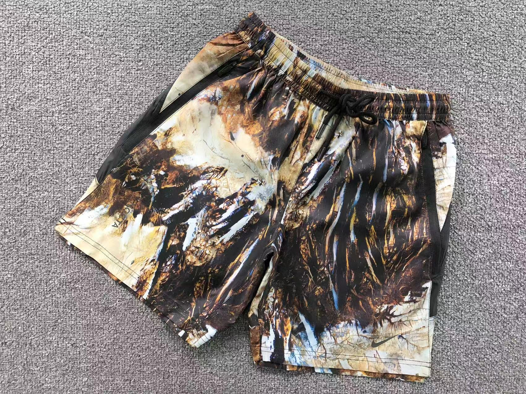 Conjunto Nocta x Nike “NRG AU Track Camo”