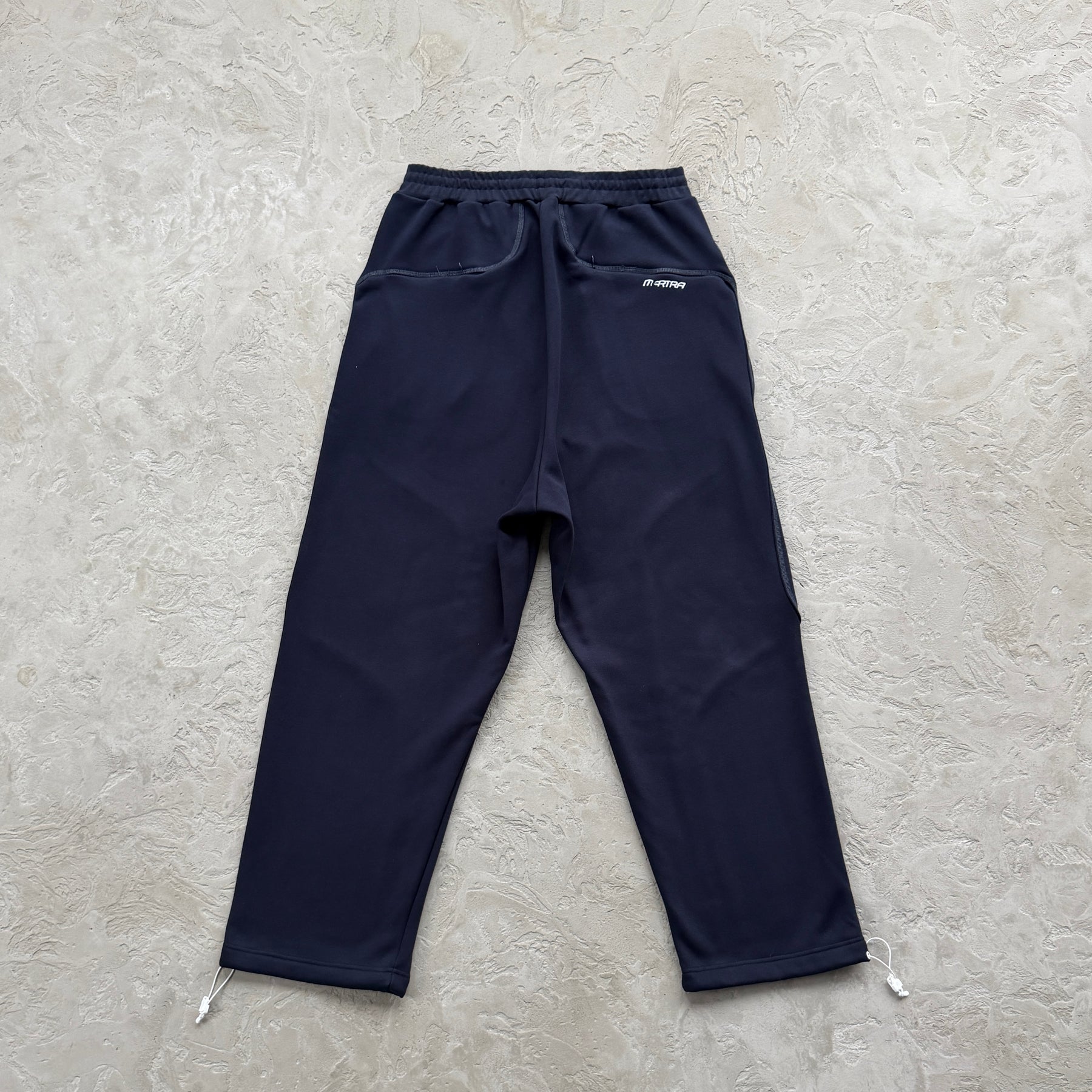 Conjunto Mertra “Glide Overlock Trackie”