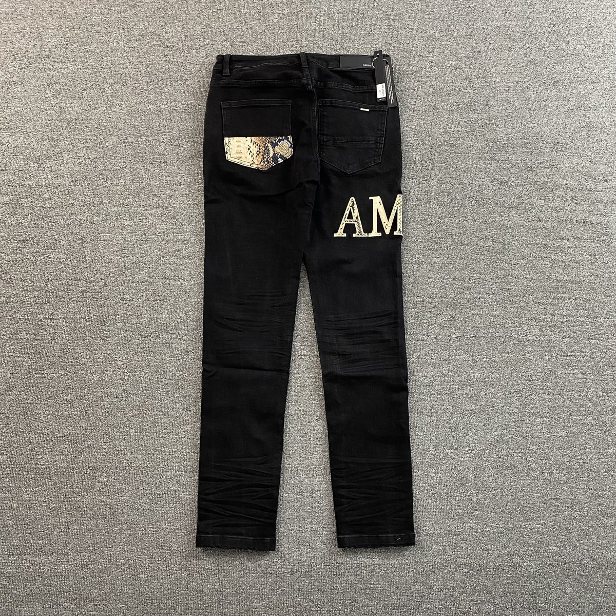 Calça Amiri “Snake Skin”