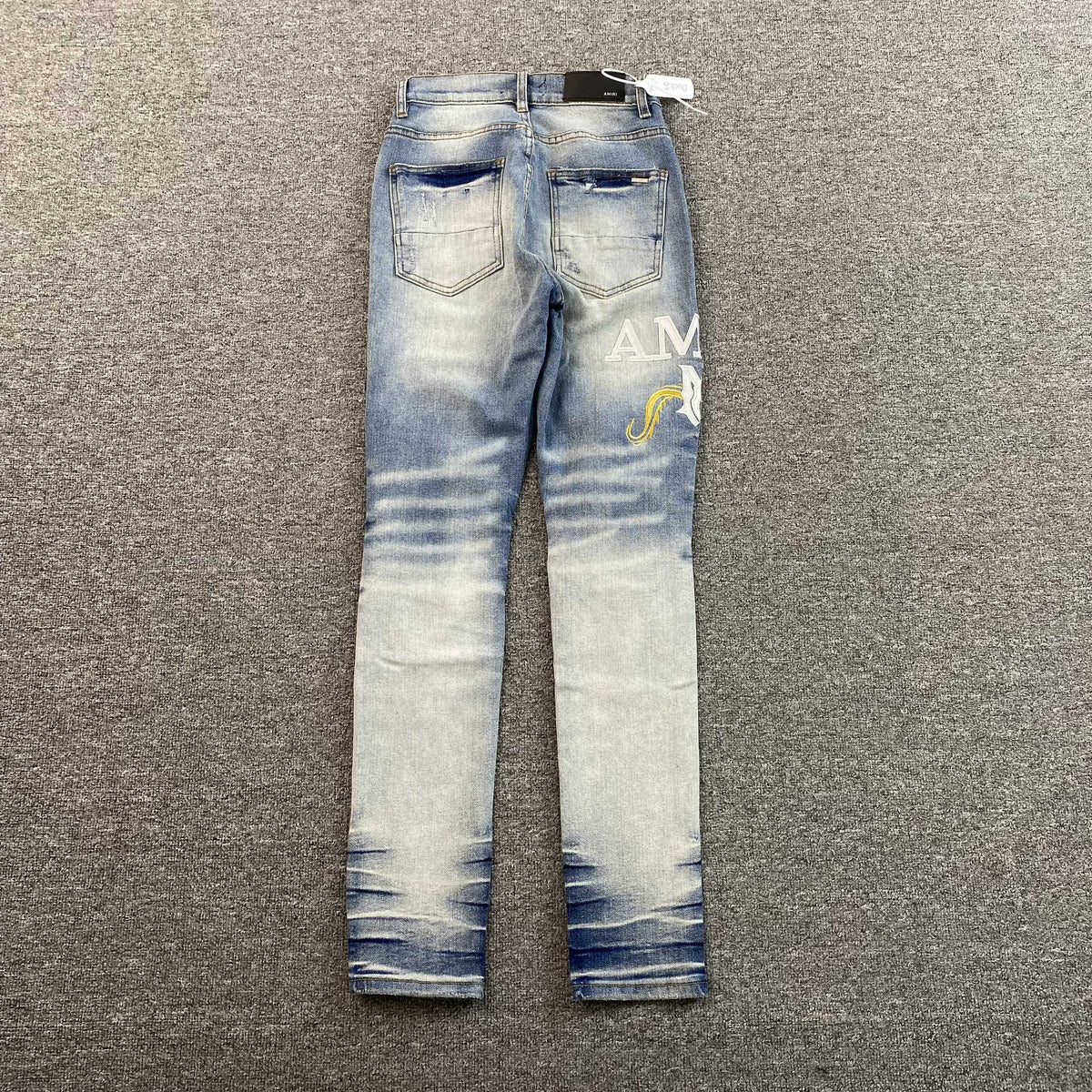 Calça Amiri “Torn Jeans”