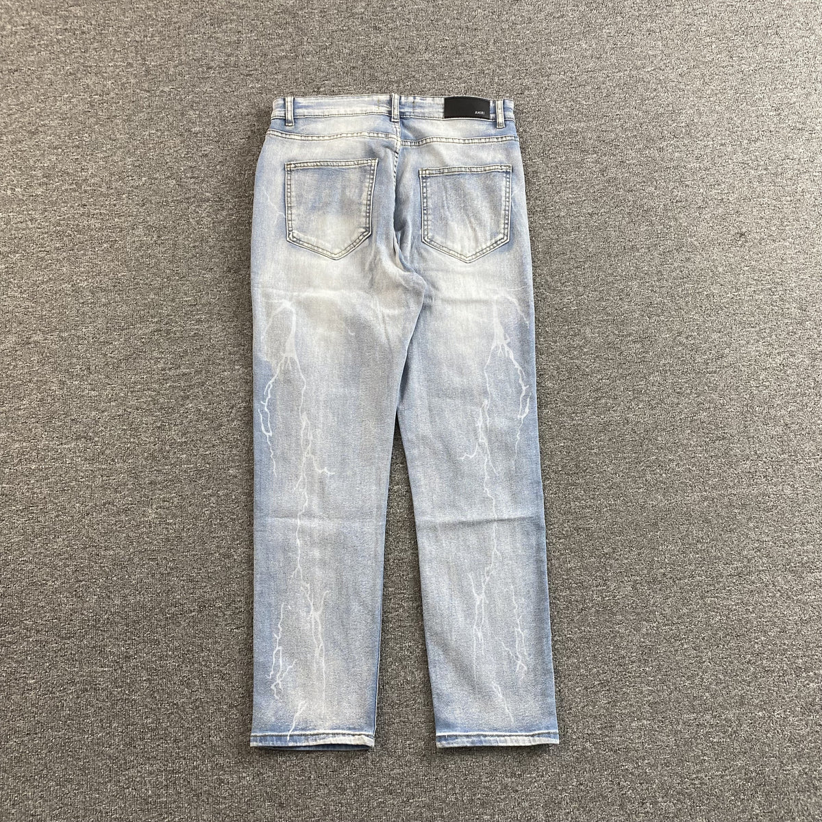 Calça Amiri “Script Logo”
