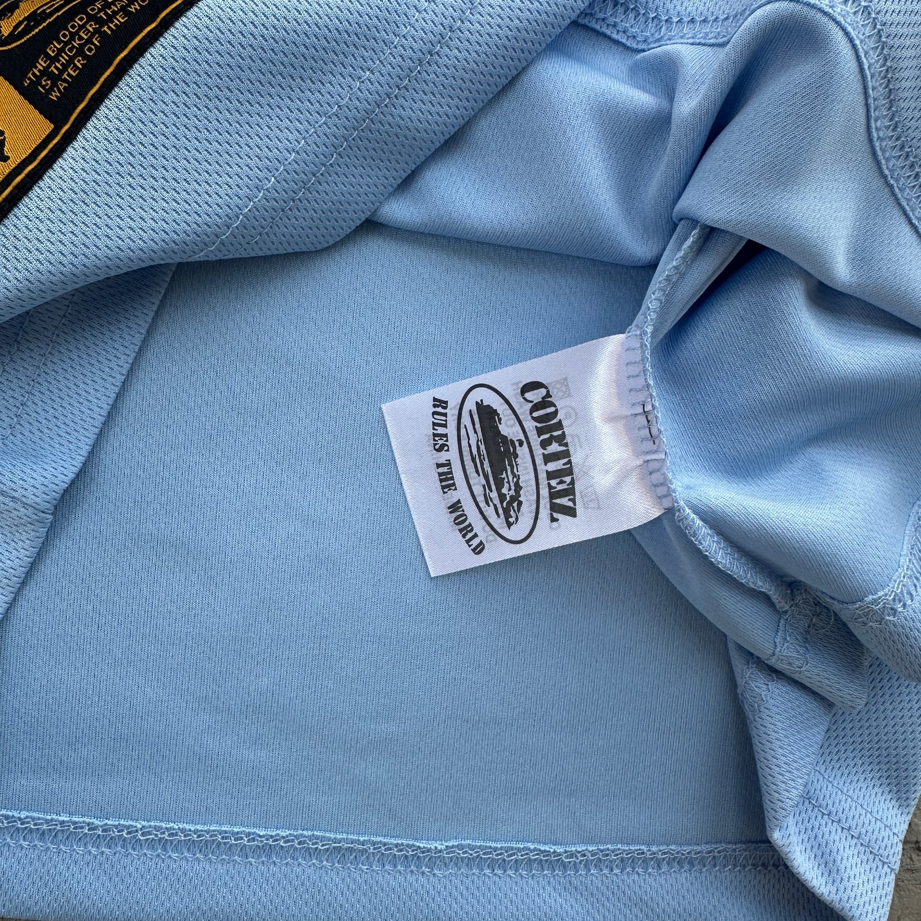 Camisa Corteiz “Panel Sky Blue Jersey”