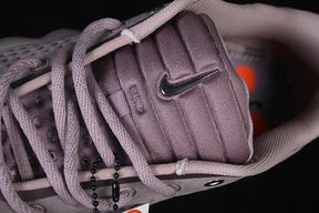Nike mind 002 “Metallic Cool Grey”