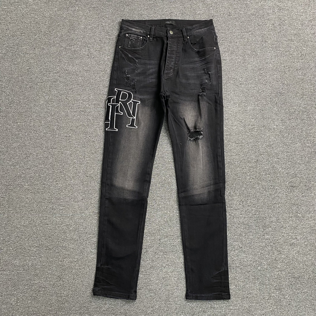 Calça Amiri “Staggered” ( Preta )