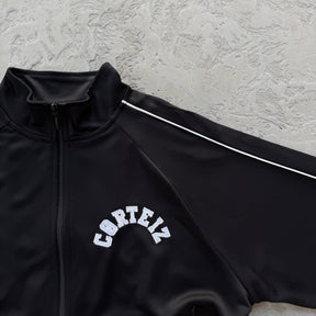 Conjunto Corteiz “Crest Arch Track Set”