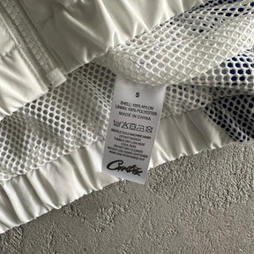 “Conjunto Corteiz” Olympic Shuku ( Branco com azul )