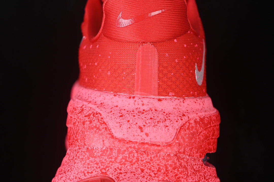 Nike Vomero “University Red Hyper Pink"